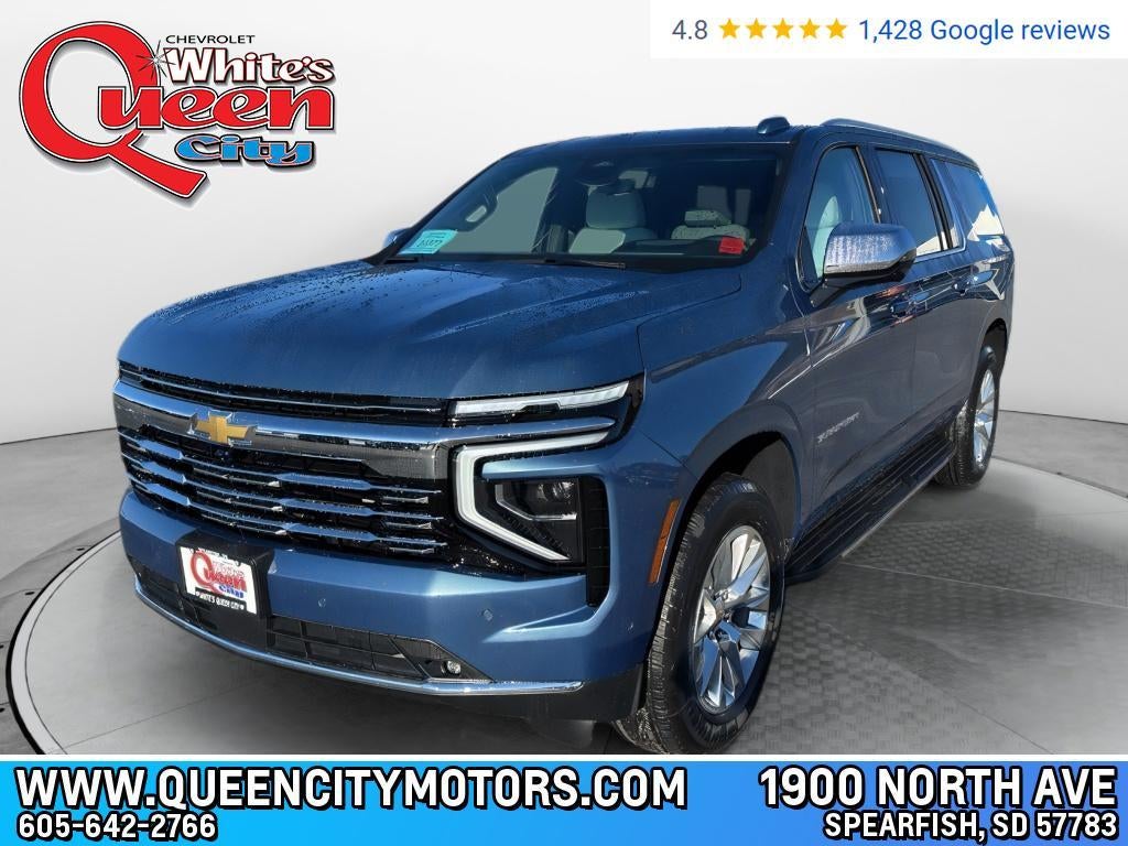 2026 Chevrolet Suburban Premier in Lakeshore Blue Metallic — front three-quarter view