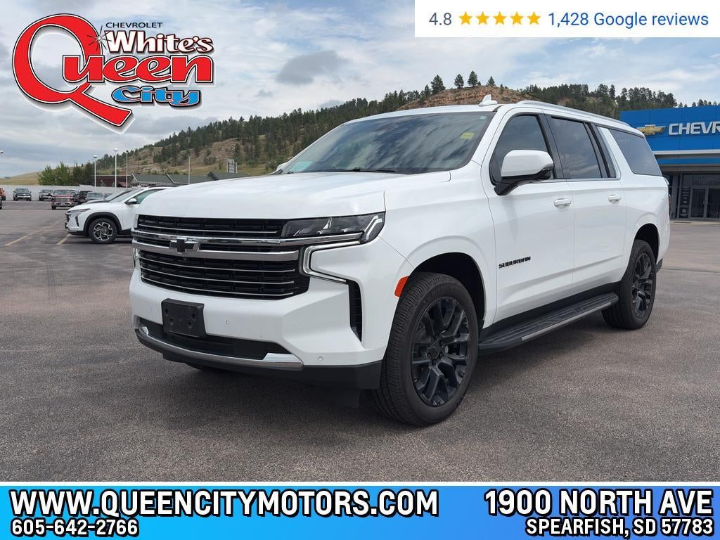 2023 Chevrolet Suburban LT in Summit White — front three-quarter view