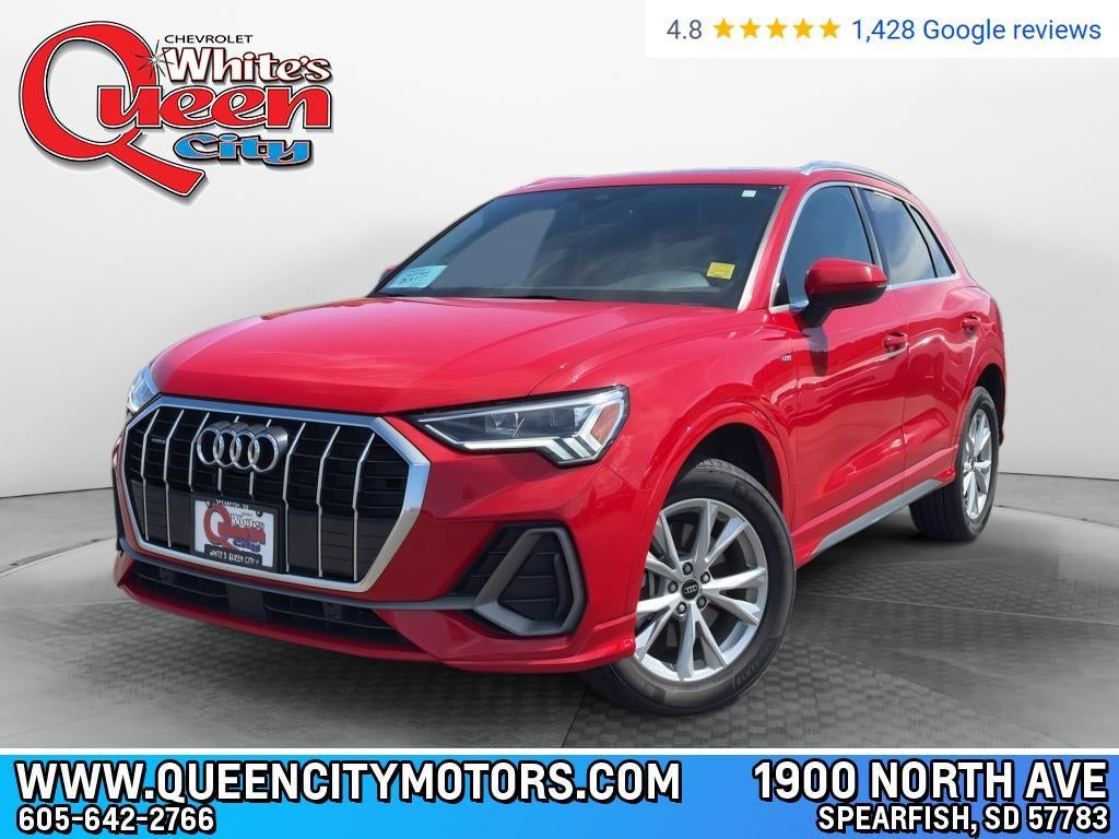 2024 Audi Q3 S line Premium 45 TFSI quattro in Red — front three-quarter view